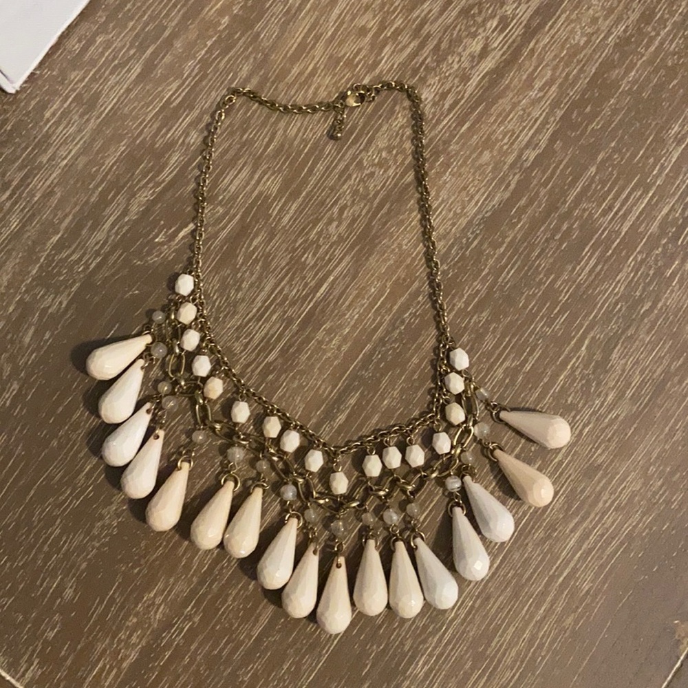Pink and gold necklace.